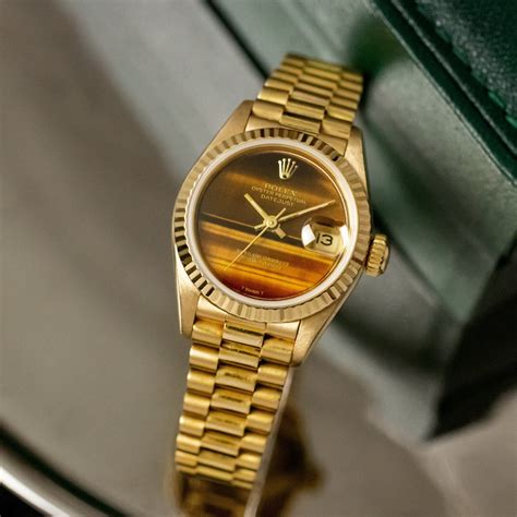 rolex lady date just tiger eye.